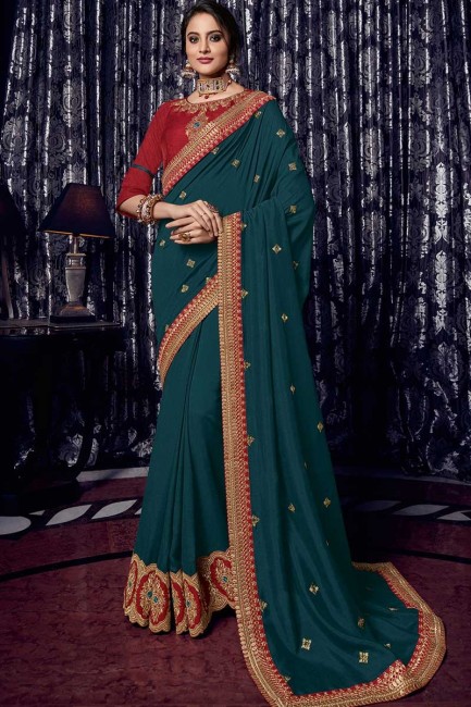 peacock green silk fabrics saree