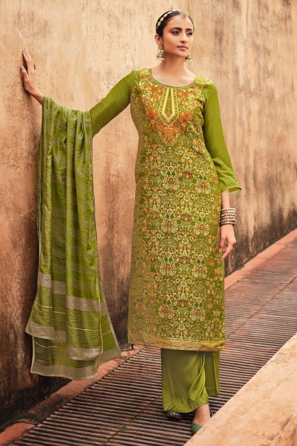 Green Salwar Kameez in Jacquard and silk with Weaving