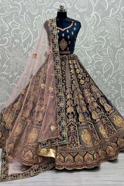 Velvet Bridal Lehenga Choli in Morpeach with Embroidered