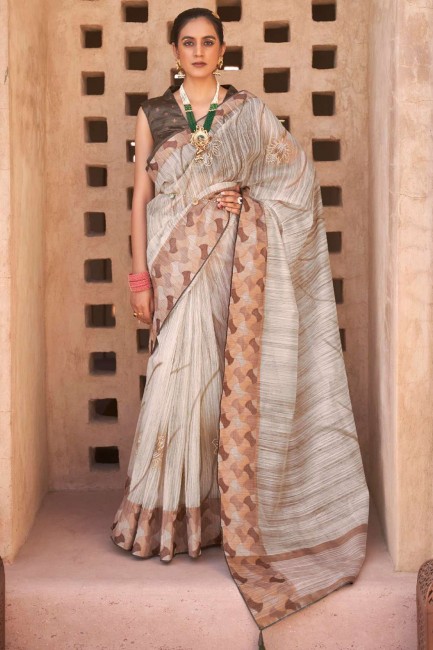 Off white Saree in Silk with Printed,weaving,lace border