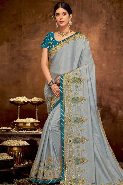 Enticing Grey Georgette and silk saree