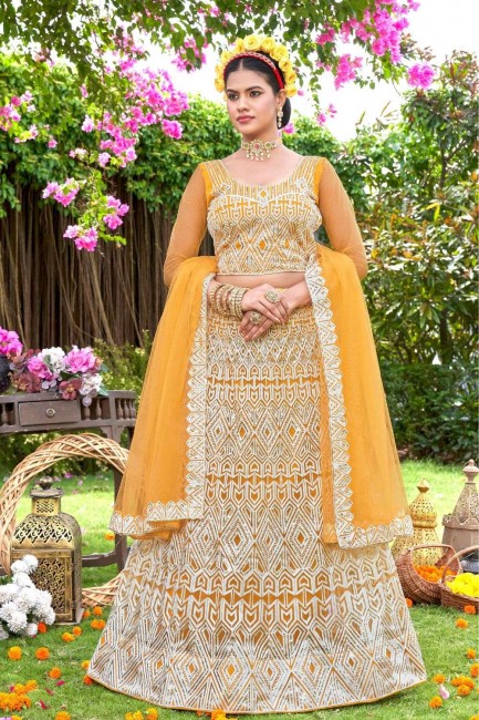 Wedding Lehenga Choli in Yellow Net with Embroidered