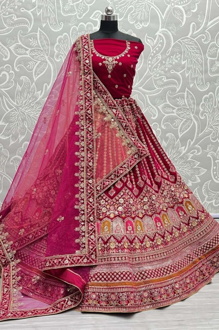 Embroidered Velvet Bridal Lehenga Choli in Rani