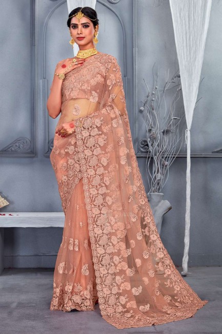 Party Wear Saree in Dusty peach Net with Zari,stone,embroidered
