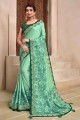 Enticing Green Georgette and silk Saree