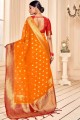 Alluring Banarasi raw silk Banarasi Saree in Orange