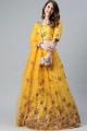 Embroidered Soft net Party Lehenga Choli in Yellow with Dupatta