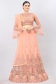 Net Party Lehenga Choli in Peach with Embroidered