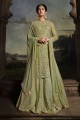 Net Lehenga Suit in Green with Embroidered