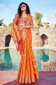 Weaving Banarasi Saree in Orange Banarasi silk