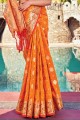 Weaving Banarasi Saree in Orange Banarasi silk