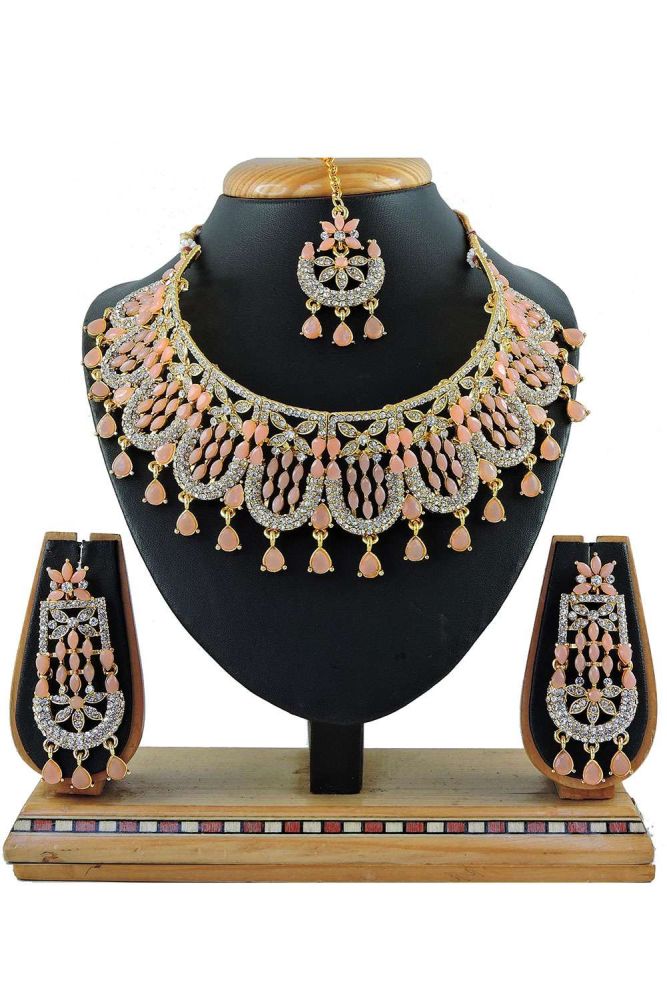 Buy Online Peach color Stones pearls Necklace Get this Necklace earrings set Jewellery at Shopkund