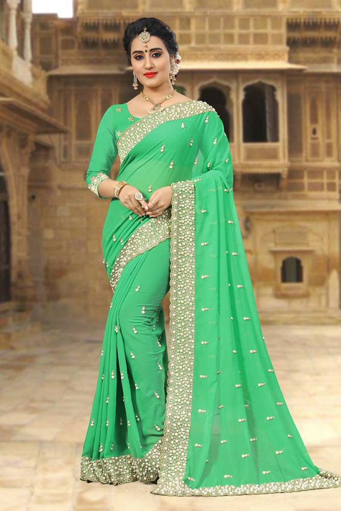 Green color Georgette saree Online Designer Georgette Blouse with Georgette Saree at Shopkund in India