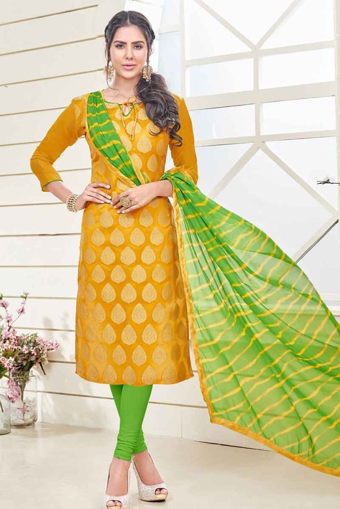 Dark Yellow color Banarasi Jacquard Churidar Suit Online Designer Churidar Suit with Green Dupatta in India